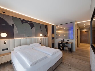 Camera familiare moderna con zone notte separate