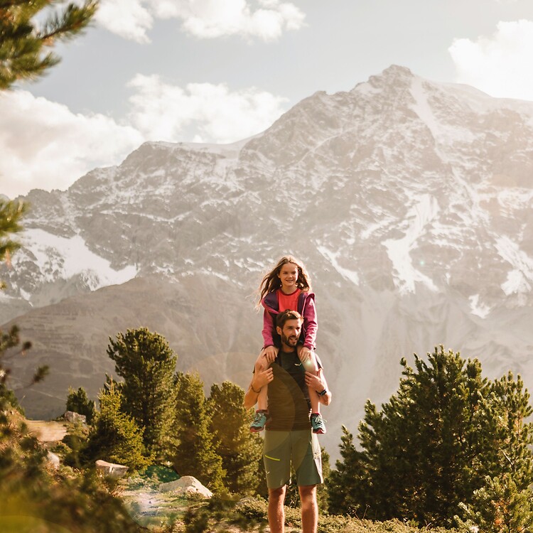 Family hiking in the mountains
