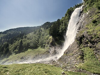 Waterfall in the mountains during the day