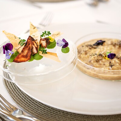 Gourmet plate decorated with mushrooms and flowers