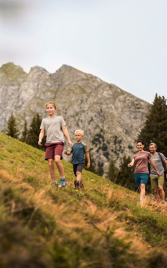 Family on a mountain hike at Meran 2000