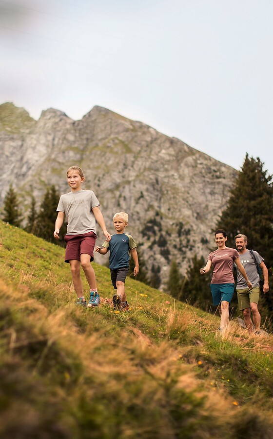 Family on a mountain hike at Meran 2000